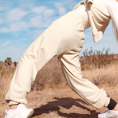 A picture containing person, outdoor, player, trouser

Description automatically generated