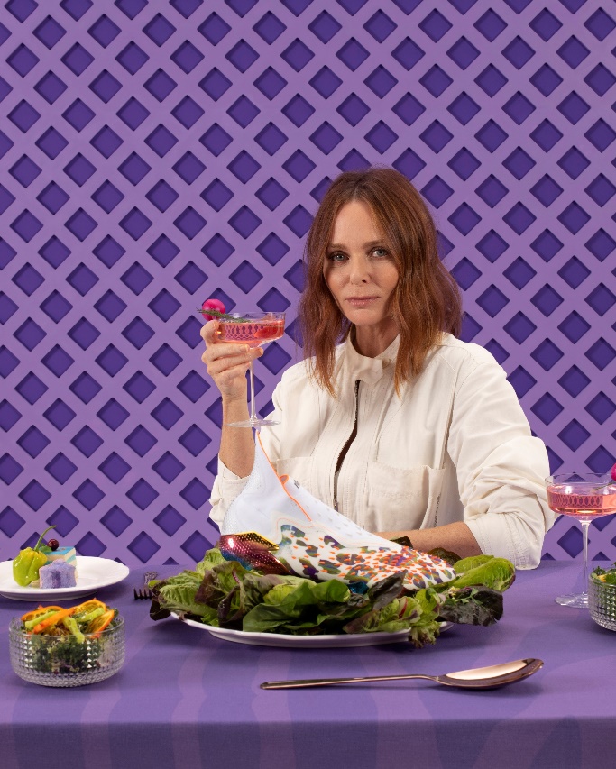 A person sitting at a table with food and a drink

Description automatically generated with low confidence
