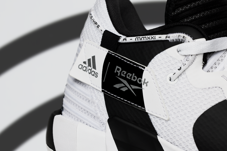 A picture containing text, footwear

Description automatically generated