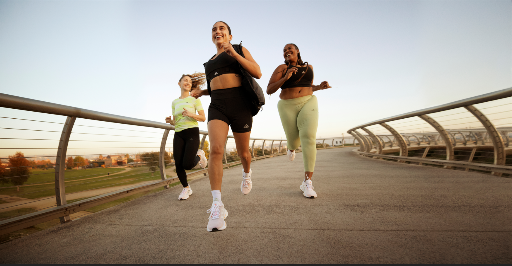A group of women running on a road

Description automatically generated with medium confidence