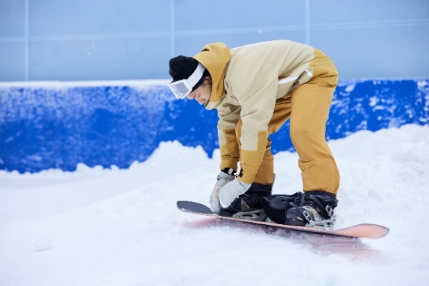 A snowboarder slides down a slope

Description automatically generated with medium confidence